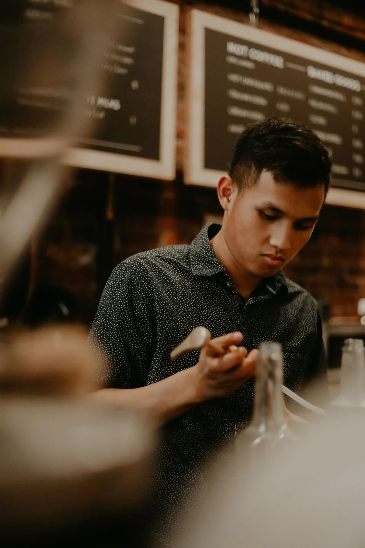 A barista at work in a neighbourhood café